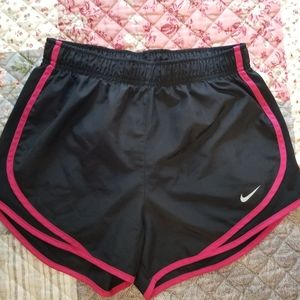 Women's Nike tempo running shorts. Size small, black and pink